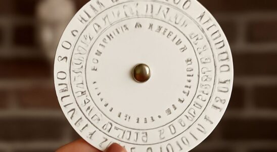 Creator testing a code and pattern escape-room puzzle with clue cards