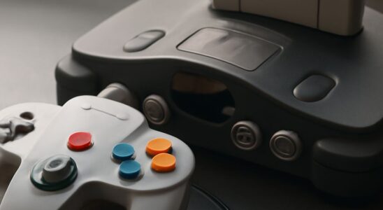 Nintendo 64 console and cartridges representing its most popular N64 games